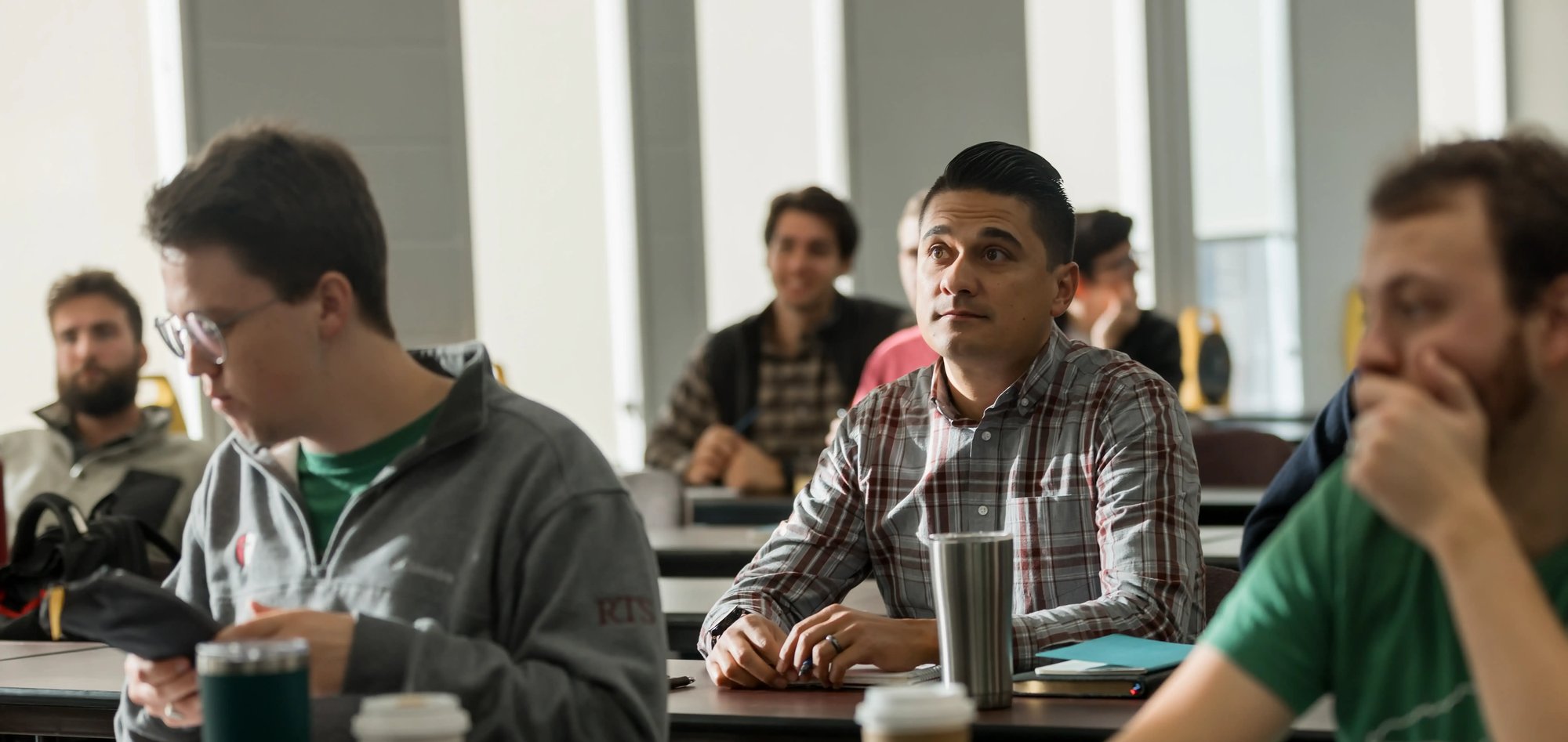 Students seated at desks listening attentively during a classroom lecture at Reformed Theological Seminary