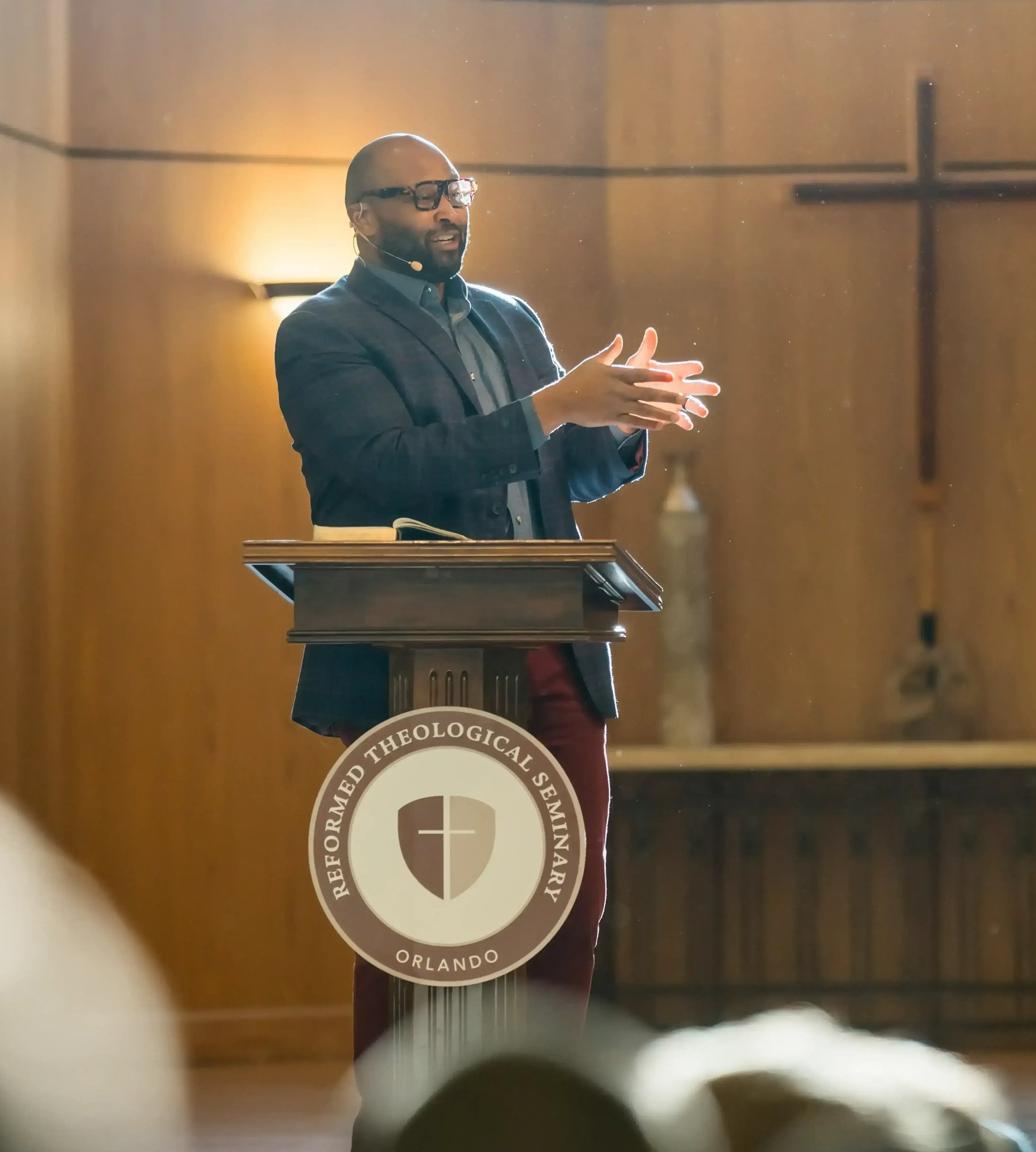 rts-pastor-speaking-at-podium-in-chapel